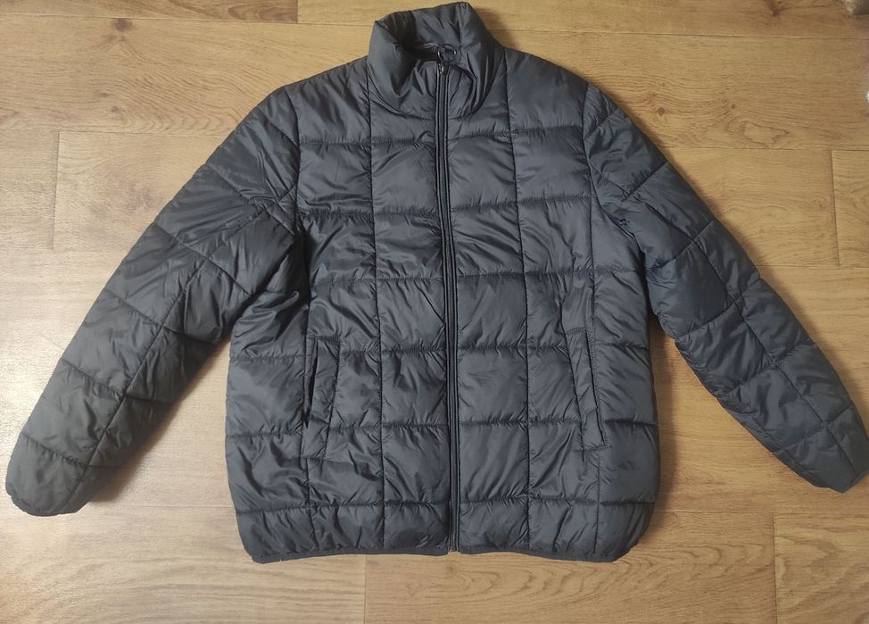 Продам курточку черного цвета  размер 52-54