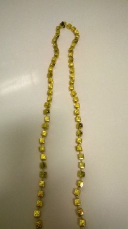 Colar dados dourado comprado em Las Vegas (portes incluídos)