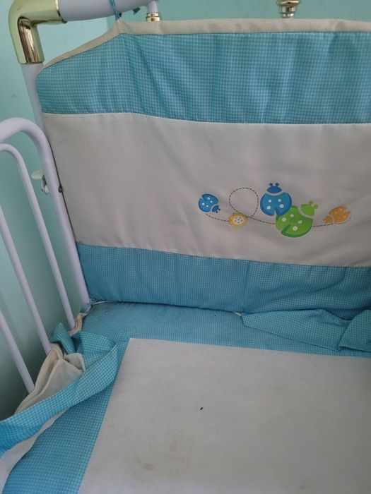 Дитяче ліжечко металеве