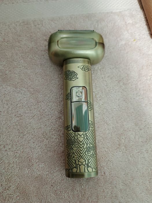 Электробритва сетка с встроенным триммером.