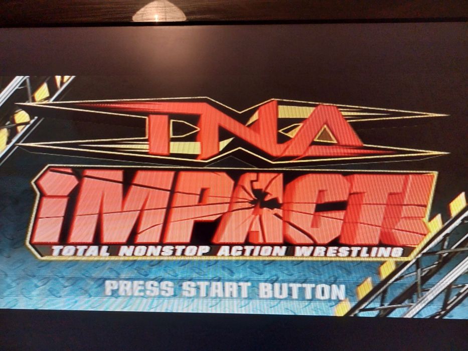 PS2 Game (PlayStation 2) TNA Impact! (Good Condition)64283967964931124