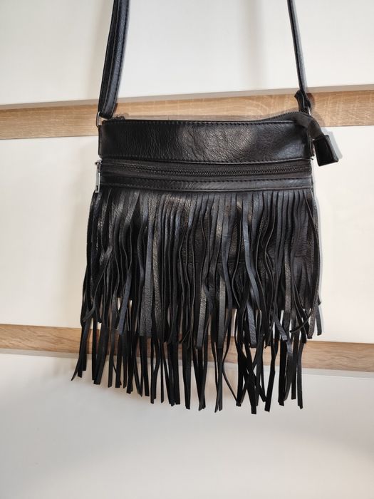 Mała listonoszka z frędzelkami