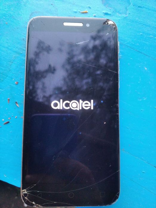 Alcatel SHINE  алкатель