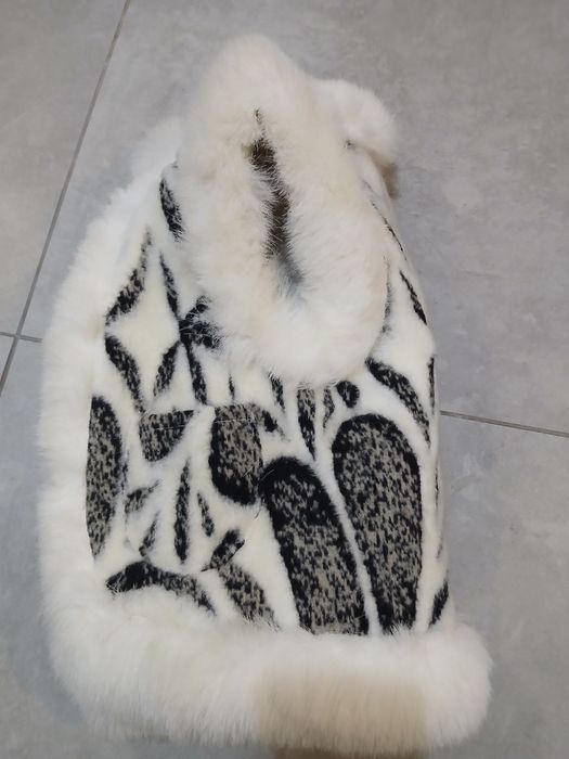 Жилетка без рукавів