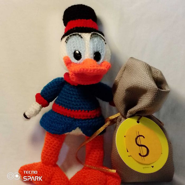 Скрудж Макдак- талісман богатства.