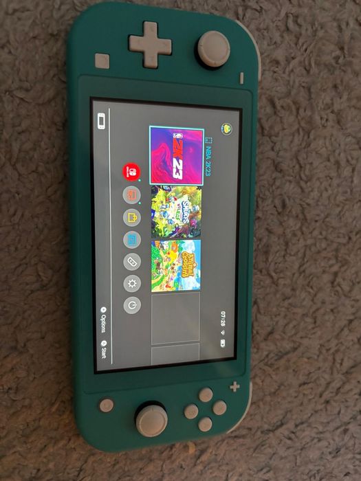 Nintendo Switch Lite + gry