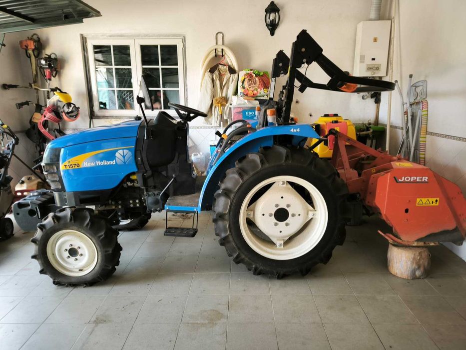 New Holland T1570 33CV – 88 Horas + 4 Acessórios