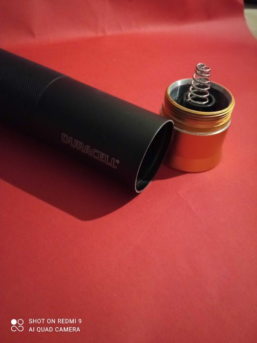 LANTERNA  "Duracell" - Preto e Dourada430452233523046406