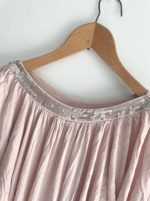 Pudrowo różowa bluzka z cekinami krój szeroki nietoperz plus size