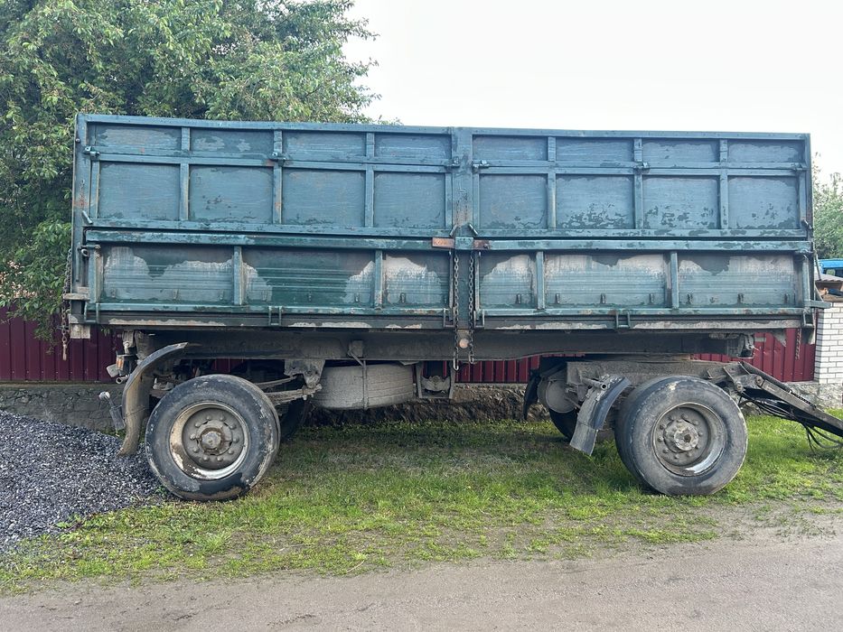 Камаз самоскид з причепом.