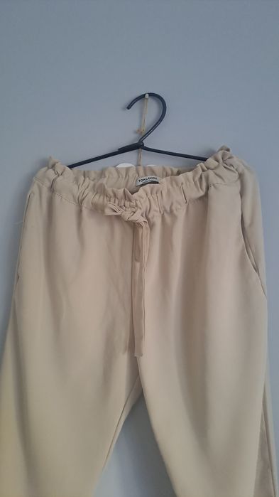 Spodnie eleganckie beżowe L/ XL