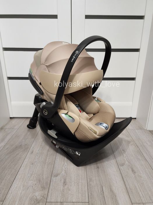 Розкладне автокрісло Cybex Cloud T plus i-size Cozy beige Сайбекс бежеве