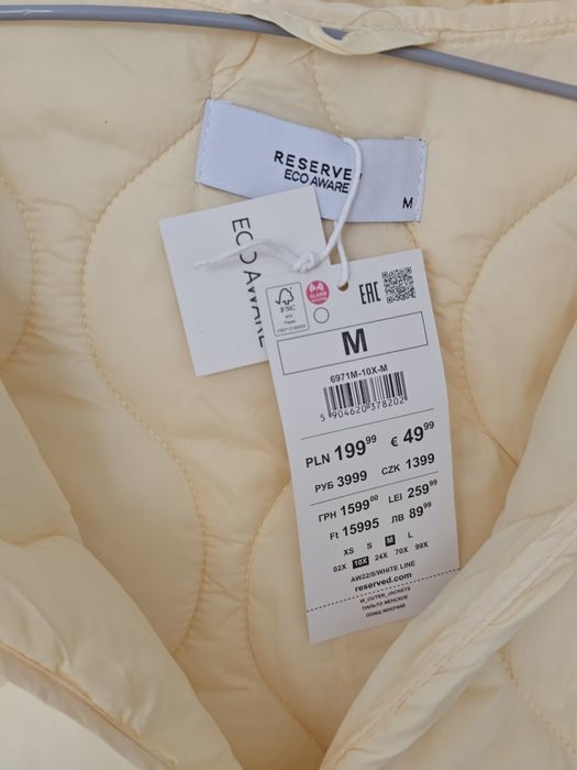 Jasnożółty pikowany płaszcz Reserved