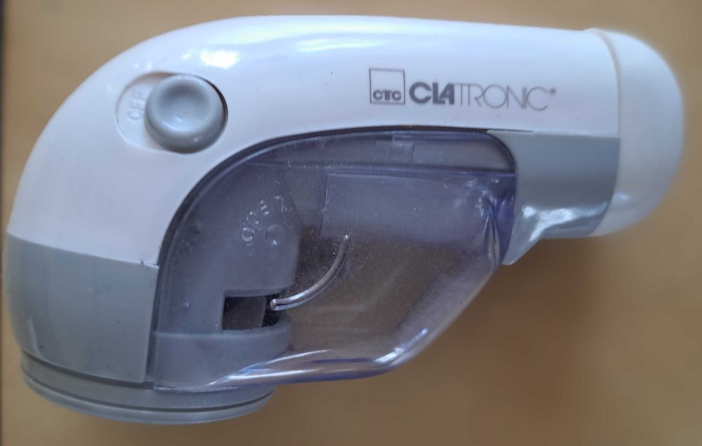 Golarka na baterię do zmechaconych ubrań, swetrów itd. .