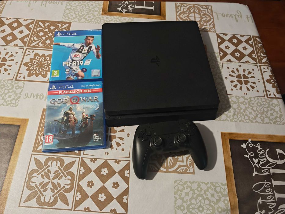PS4 slim 1TB com dois jogos e TV 32 polegadas.