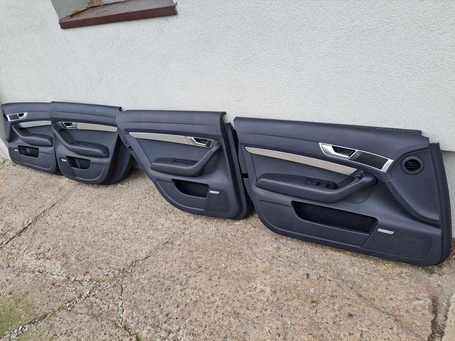Boczki tapicerka drzwi Audi A6 C6 BOSE granatowe