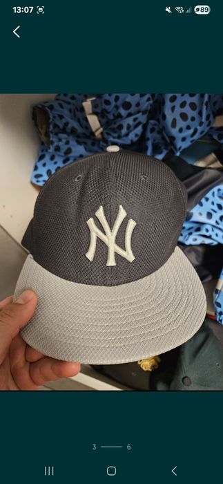 Czapki New Era..