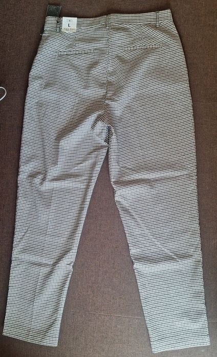 Eleganckie w kratkę spodnie damskie