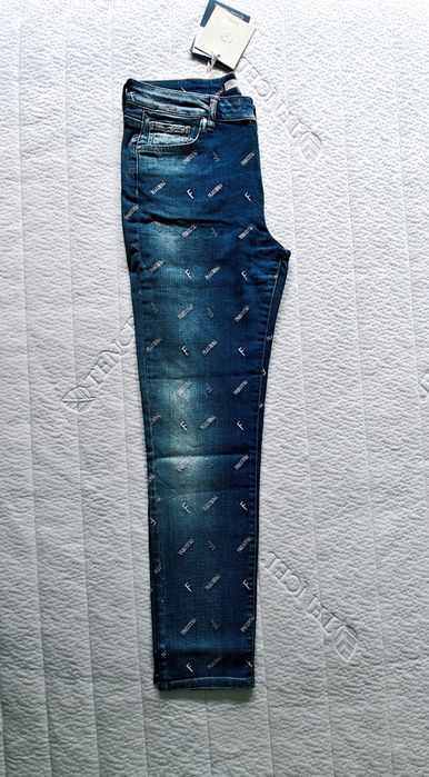 Nowe spodnie damskie z logo FRaCOMiNA dżinsy nowe