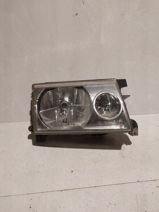 Nissan terrano II 2 lift polift prawa lampa przednia prawy reflektor