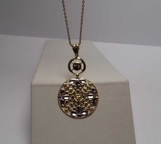 Złota dwukolorowa zawieszka ruchome elementy.