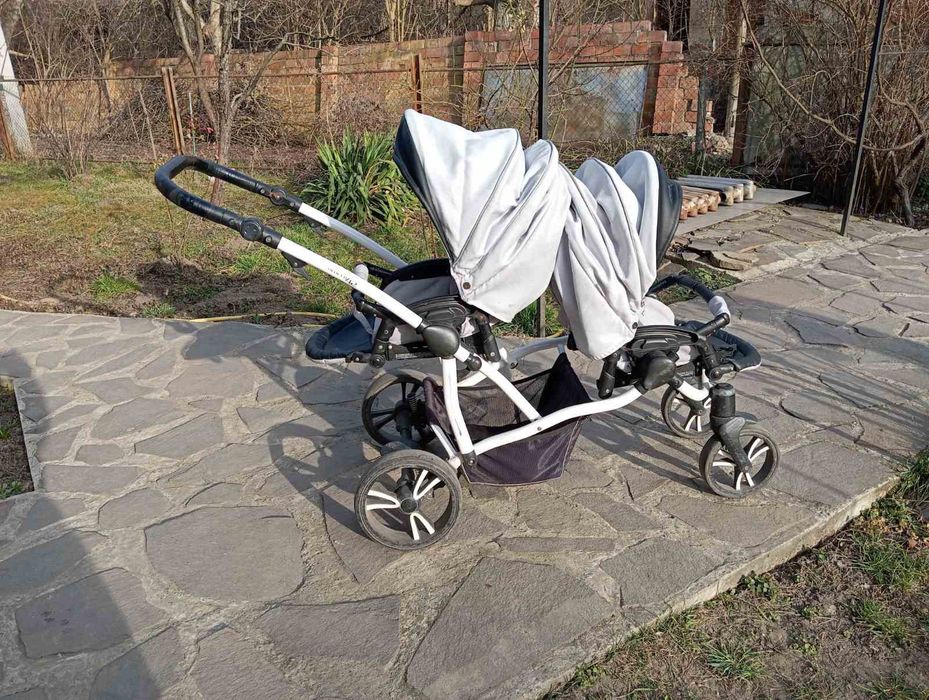 Дитяча каляска для двійнят
