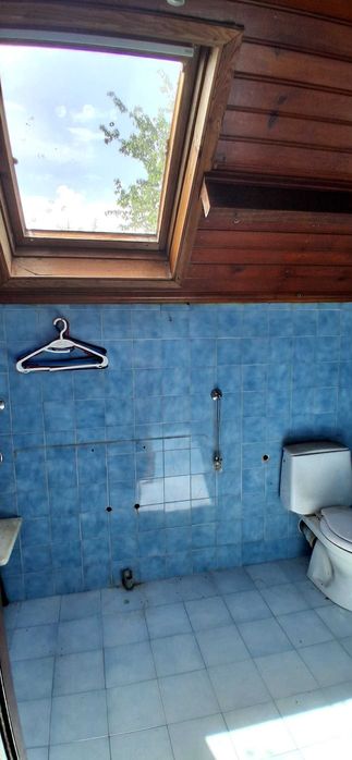 Casa espaçosa com anexos e jardim