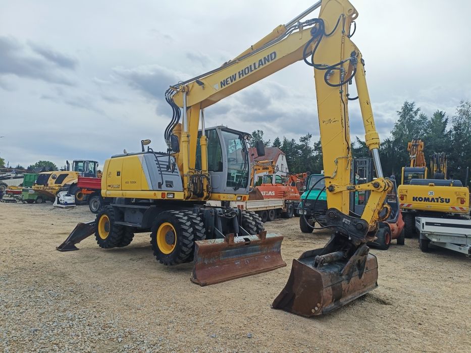 Maszyna budowlana koparka New Holland MH Plus  Ramie LONG