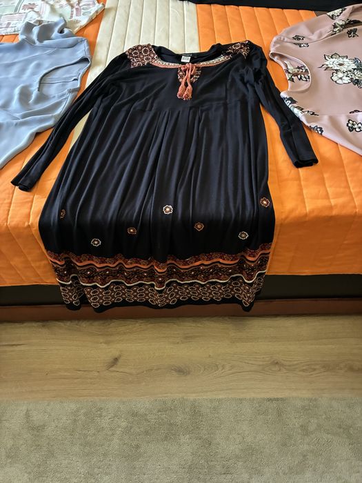 Vestuário de senhora como nova