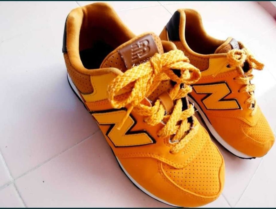 Ténis NB amarelo