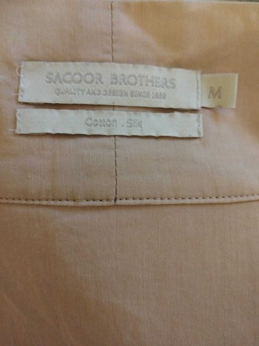 Blusa bege, marca Sacoor