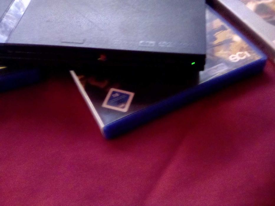 Vendo PlayStation 2 Slim com jogos