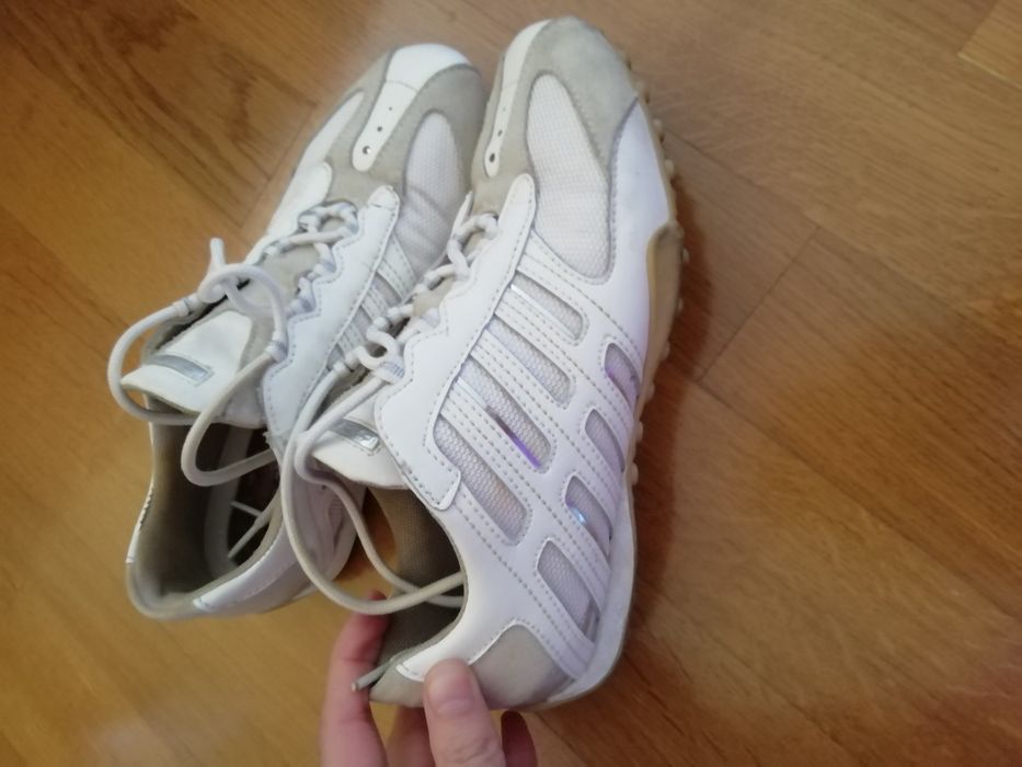 Ultra-comfortable and breathable Geox brand sneakers. White color.
