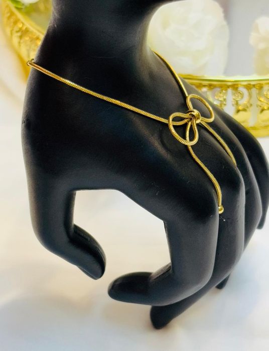 Złota bransoletka kokarda żyłka stal chirurgiczna nierdzewna