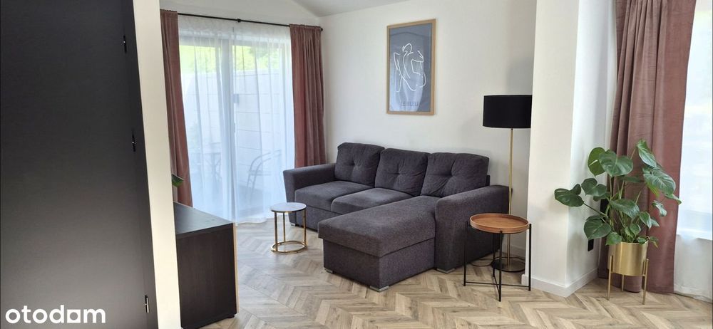 WYJĄTKOWY APARTAMENT z ogródkiem i przestronnym tarasem.