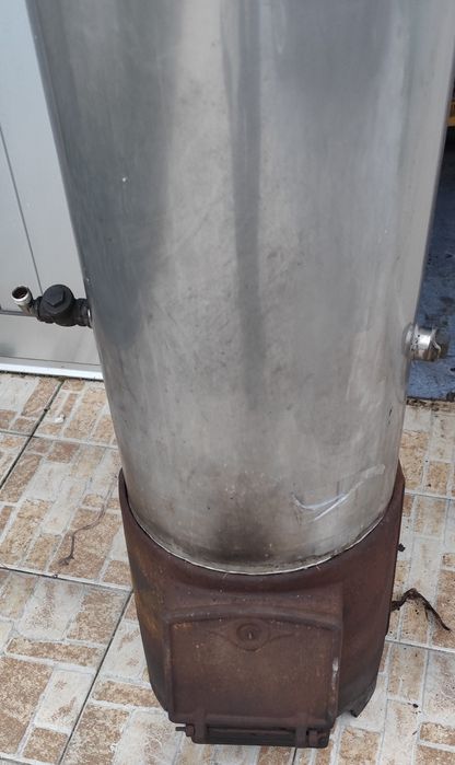 Bailarina de aquecimento água a lenha