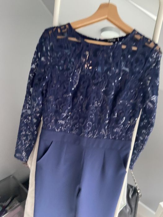 Kombinezon granatowy cekiny M nowy