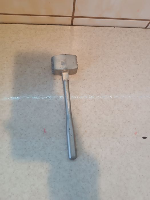 Молоток кухонний для м'яса.