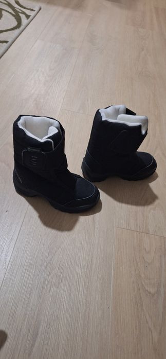 Botas da neve criança