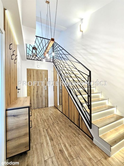 Nowoczesny, dwupoziomowy apartament z tarasem