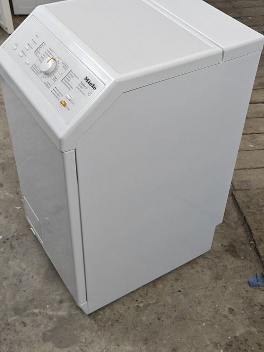 Вертикальна пральна машина Miele TopStar