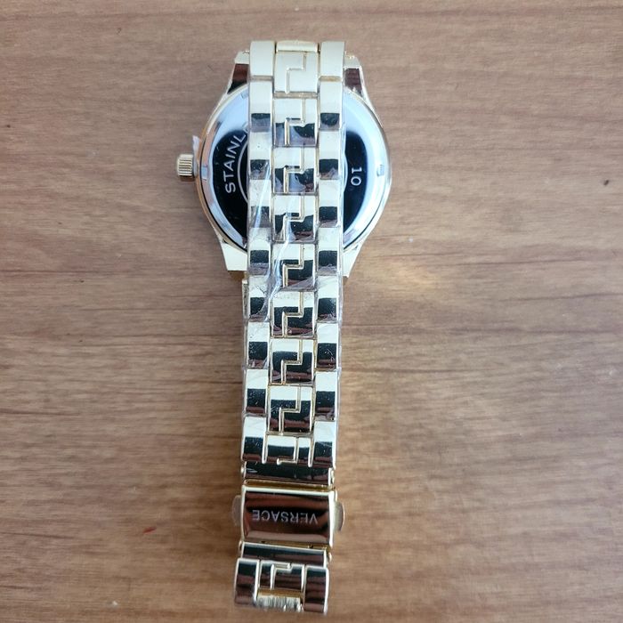 Złoty zegarek versace damski