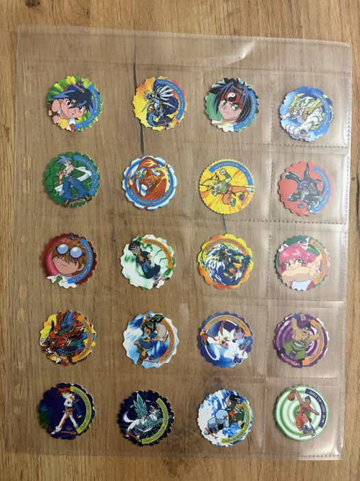 Beyblade spinner tazos 125/172