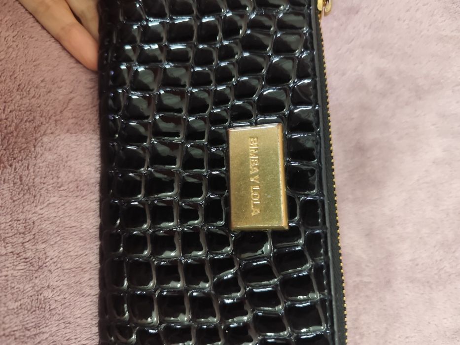 Conjunto de mala e carteira