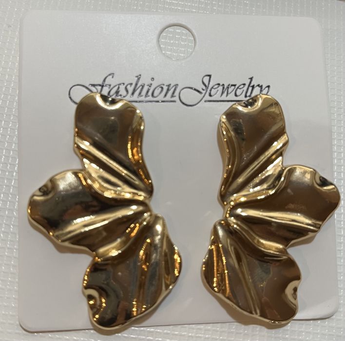 Brincos dourados em aço inoxidável