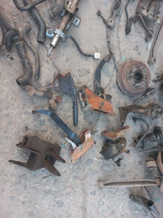 Подушки, ричаги, патрубки  Ніссан санні