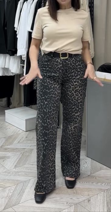 Леопардові джинси штани
