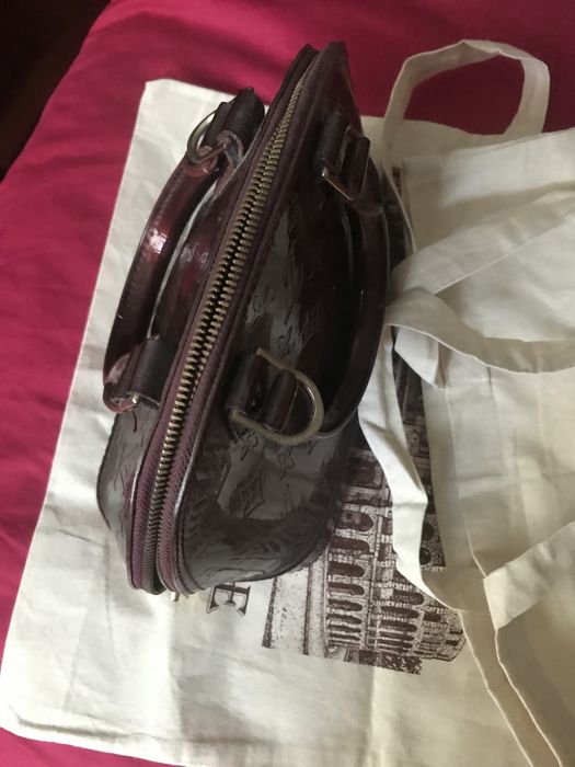 Malinha de mão da Coach