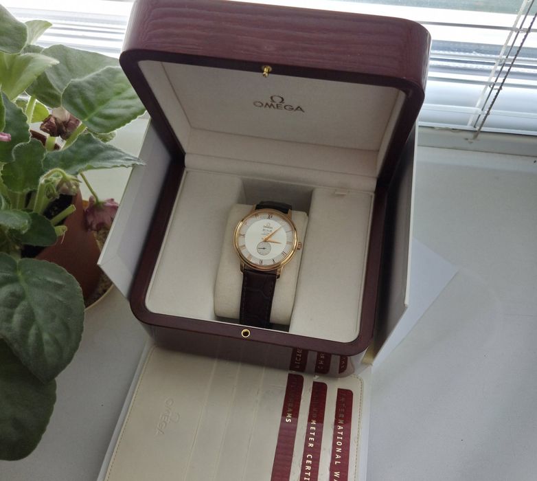 Швейцарскій годинник Omega De Ville