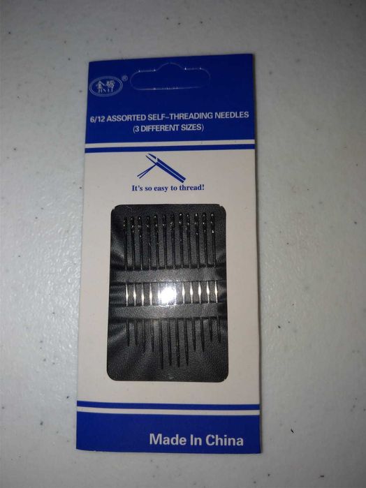 conjunto de agulhas de coser entrada da linha facilitada